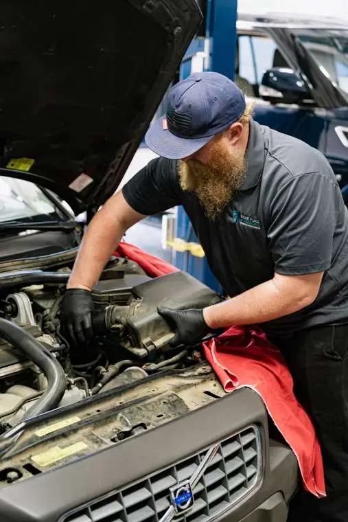Eight Flags technician working under the hood